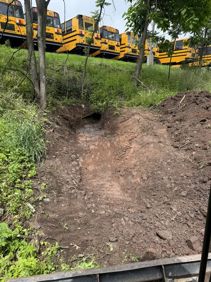 Excavation for a culvert outlet along a hillside