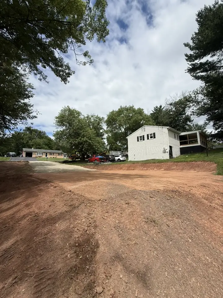 Lot graded and prepped beside a storage shed