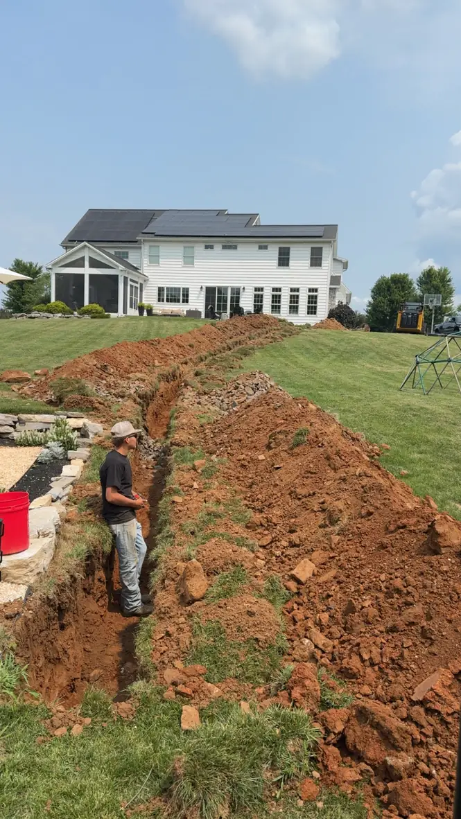 Trenching a utility line to a newly built home